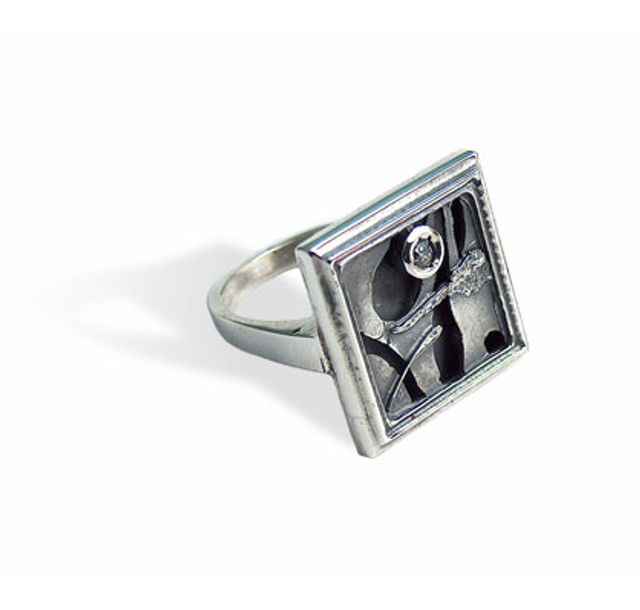 Ръчно изработен сребърен пръстен с кубичен циркон