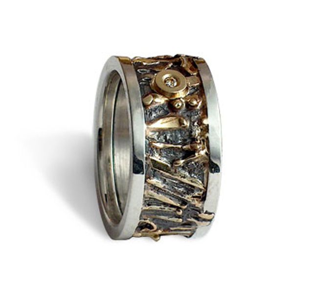 Сребърен пръстен със златни апликации и инкрустиран брилянт