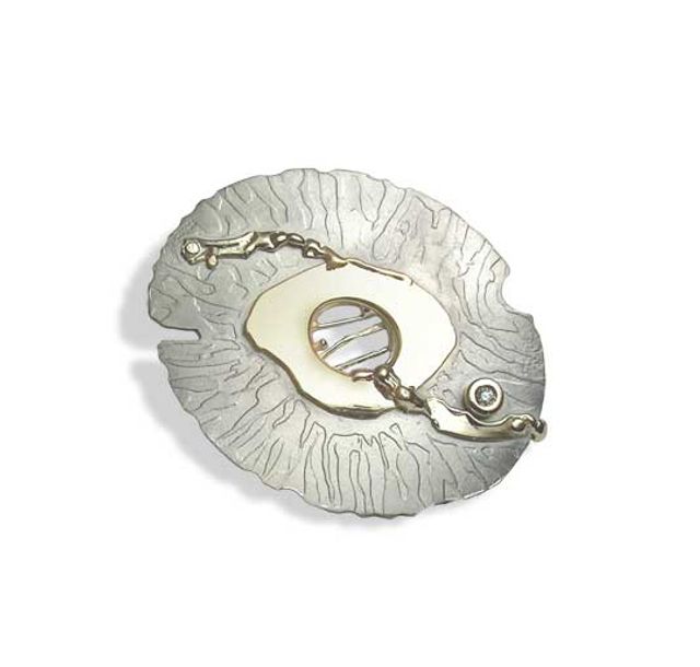 Брошка от титан и злато с брилянт