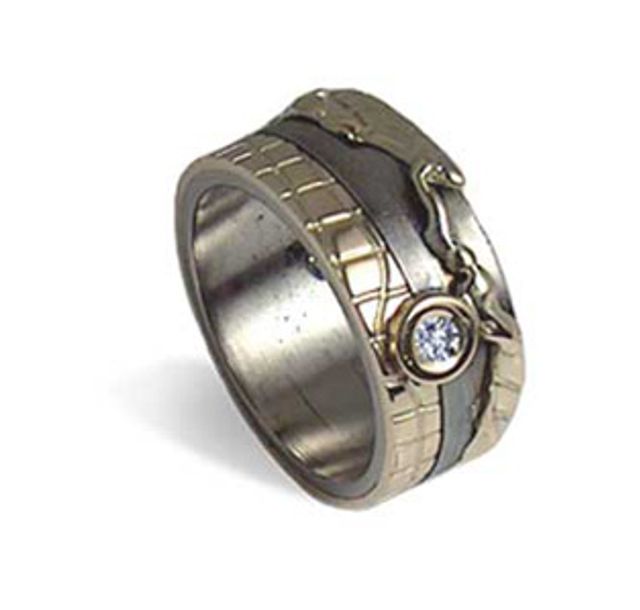 Титан, злато (14k) и брилянт (2,9 mm )